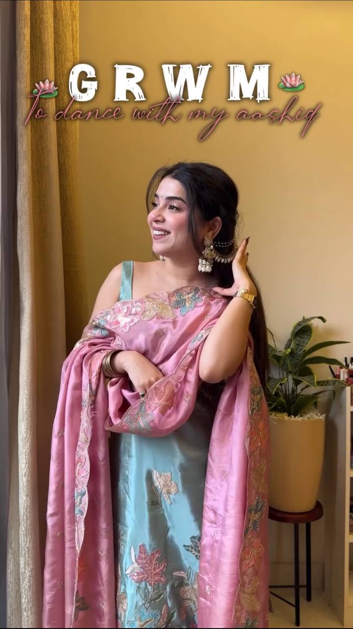 Front view of a stylish, embroidered Jimmy Choo fabric top paired with a matching circular palazzo and a delicately embroidered dupatta, perfect for elegant occasions.