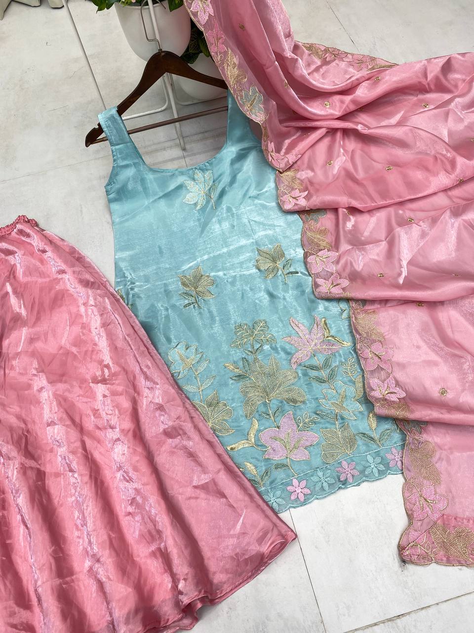Full view of a stunning Jimmy Choo fabric ensemble featuring a top with intricate embroidery, a flowing circular palazzo, and a beautifully detailed dupatta, ideal for elegant occasions