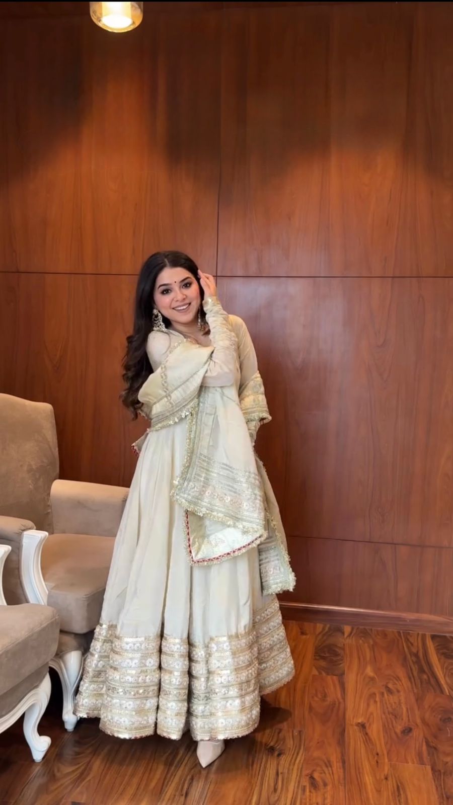 Full view of White Anarkali Set with embroidered details