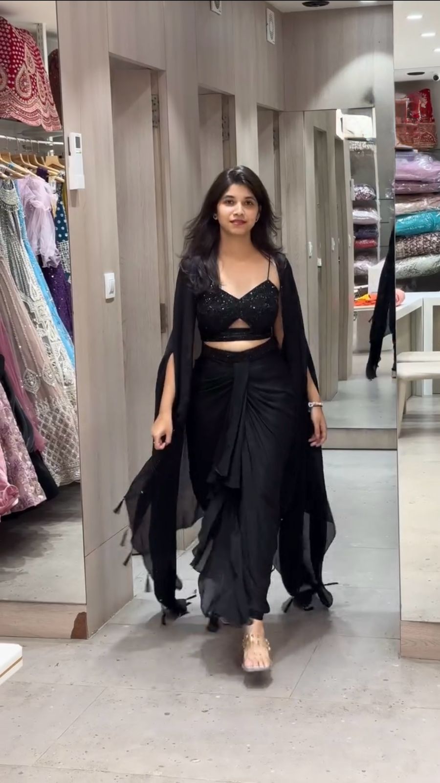 Full view of dhoti style outfit with embroidered shrug