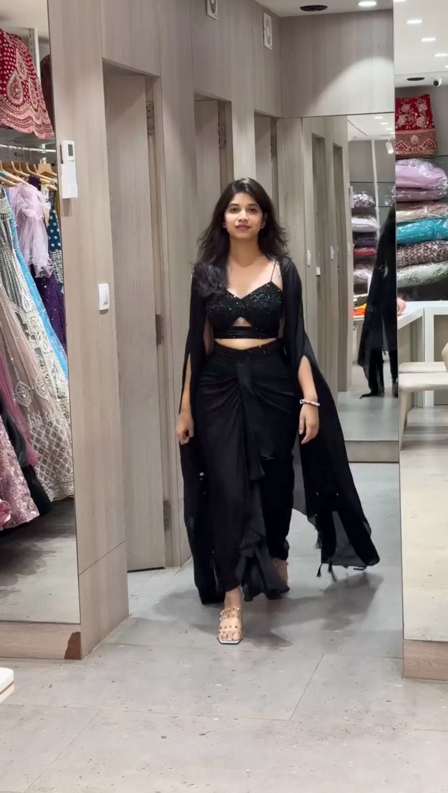 Full view of satin silk dhoti-style outfit with embroidered shrug and choli