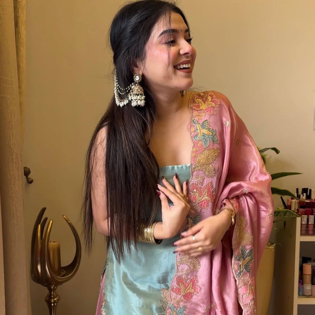 Front view of a stylish, embroidered Jimmy Choo fabric top paired with a matching circular palazzo and a delicately embroidered dupatta, perfect for elegant occasions.
