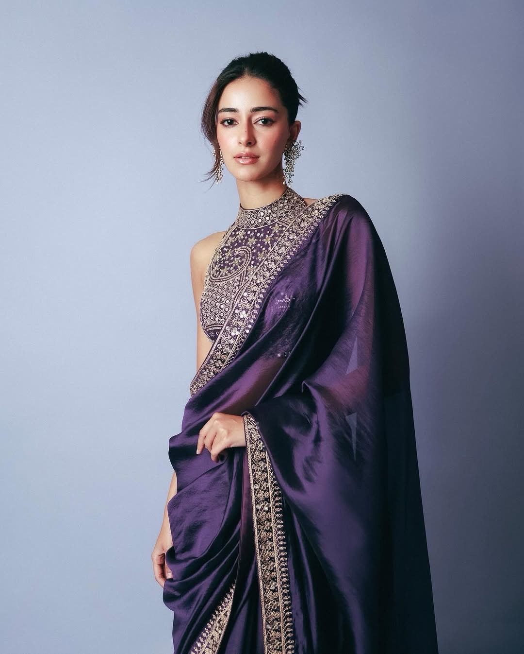 Close-up of thread and sequin work on Jimmy Chu saree fabric