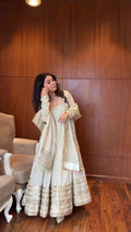 Full View of White Anarkali set with sequin embroidery, lace border, and matching dupatta

