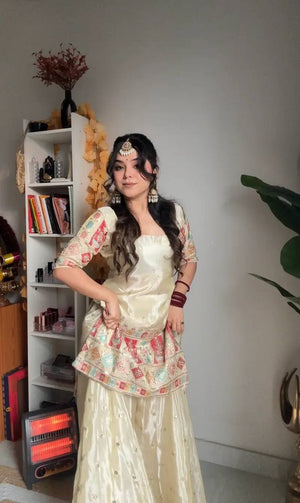 Full view of the Ghaghra with matching embroidery and lace border in Chinon silk.